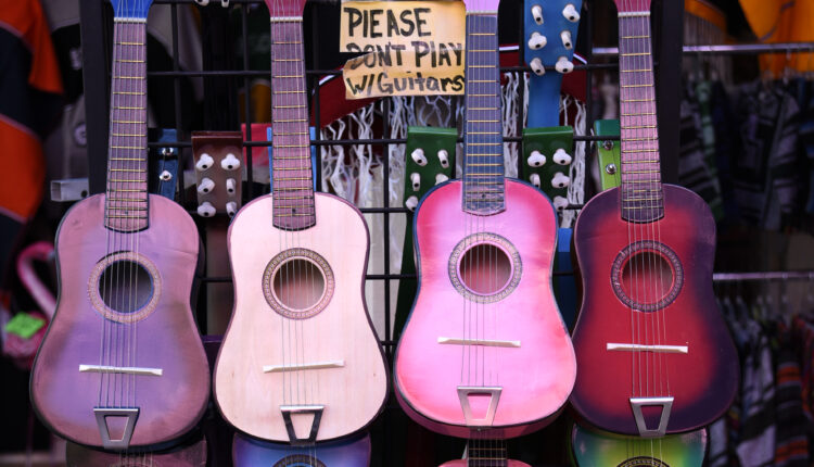 SAN ANTONIO, TEXAS - DECEMBER 9, 2018:  Colorful children's guitars are among items for sale at a shop in the Historic Market Square, also known as El Mercado, in San Antonio, Texas. (Photo by Robert Alexander/Getty Images)