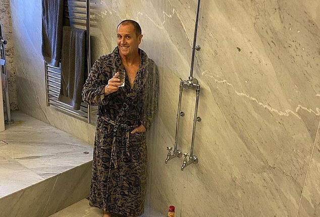 Savage: Larry Emdur was trolled by his famous friends - and daughter - Thursday after sharing this smug bathroom photo wearing nothing but an ornately patterned robe