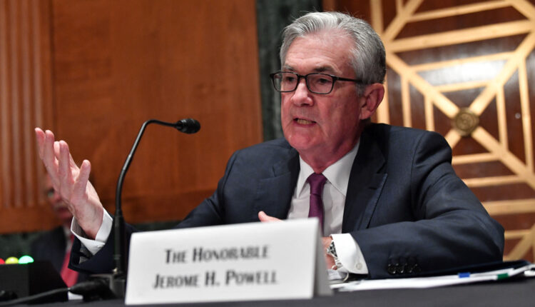 How have the Fed's bond purchases helped the economy?

