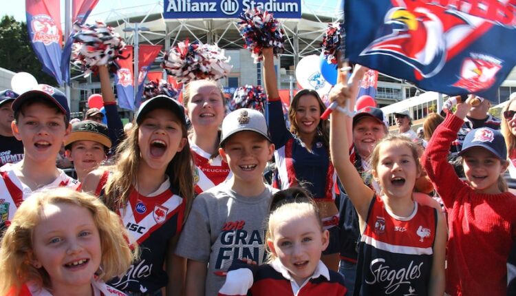 Younger Roosters fans celebrating