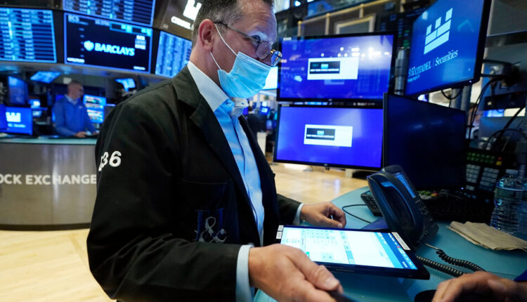 Stocks shake off bad news and rebound for the seventh straight month

