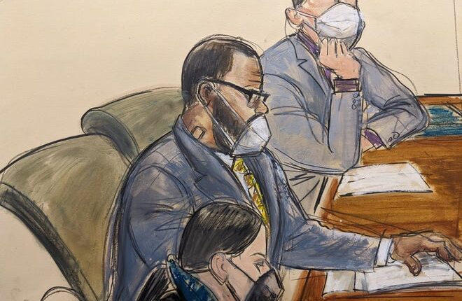 In this court sketch, R. Kelly, center, sits with attorneys Thomas Farinella, above, and Nicole Blank Becker on the first day of his defense in his sex trafficking case on September 20, 2021 in New York.